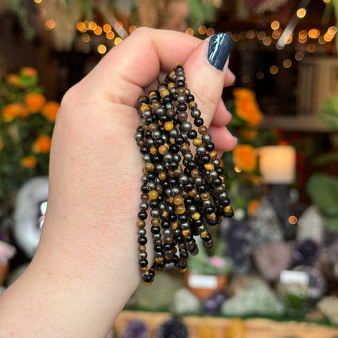 Ravenstone Crystals Black Onyx, Hematite, & Tiger's Eye Stretch Bracelet | 4mm