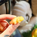Ravenstone Crystals Little Orange Calcite Axolotl