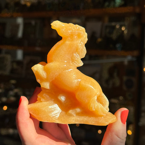 Ravenstone Crystals Orange Calcite Horse