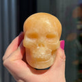 Ravenstone Crystals Orange Calcite Skull "Tyra"